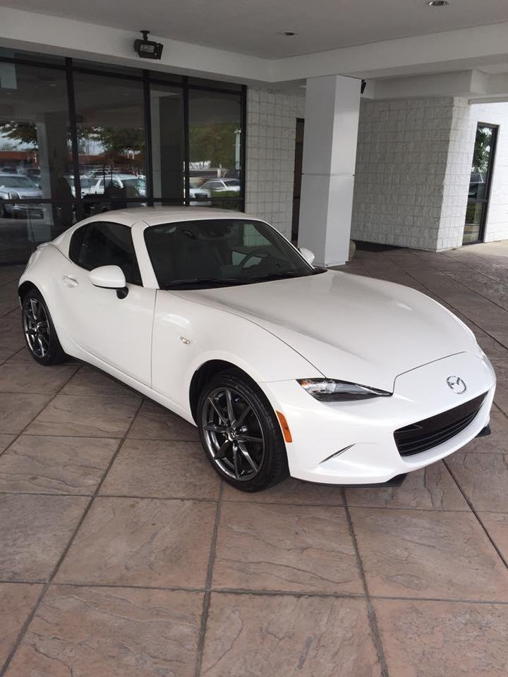 Taking Karen and Russ to pick up their new Mazda MX-5.