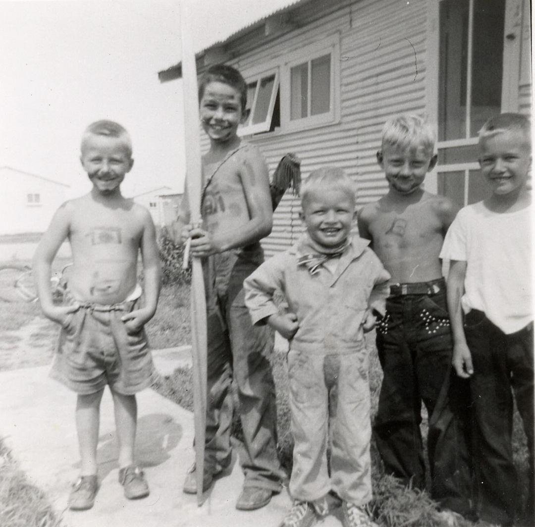 Anyone recognize these NDSU Tin Hut boys circa. 1951. Hint .. my little brother Jimmie and I are playing Farmer and Indian.