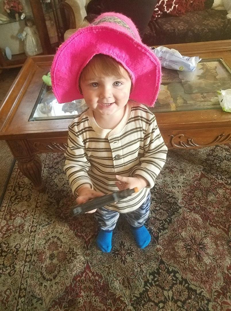 My great grandson early these morning running around playing he found a old hat of mine thought I would share this moment.