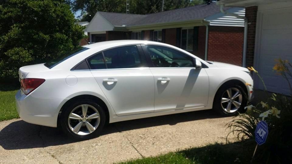 This is a picture of my sister Monica Via's New 2013 Chevy Cruz Sedan which got traded from the 2001 Dodge Durango SUV. :)