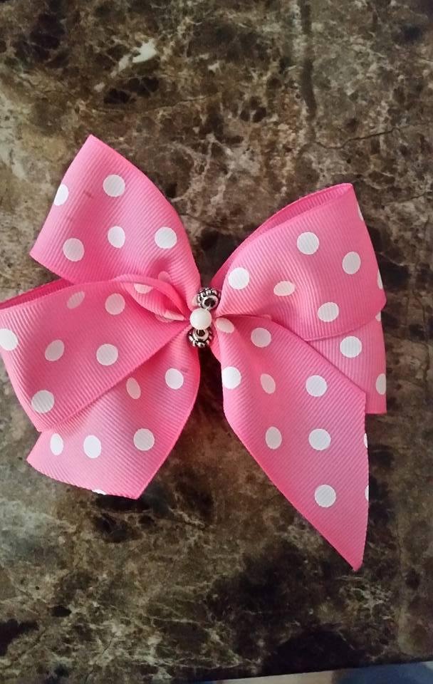 One of many to go out in Spring Bow orders. Let me know if you like any of these and want some made for your little one. $2 each and that includes shipping.