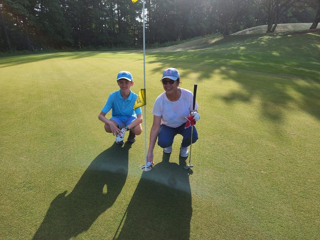 My wife's first hole in one. WOW!