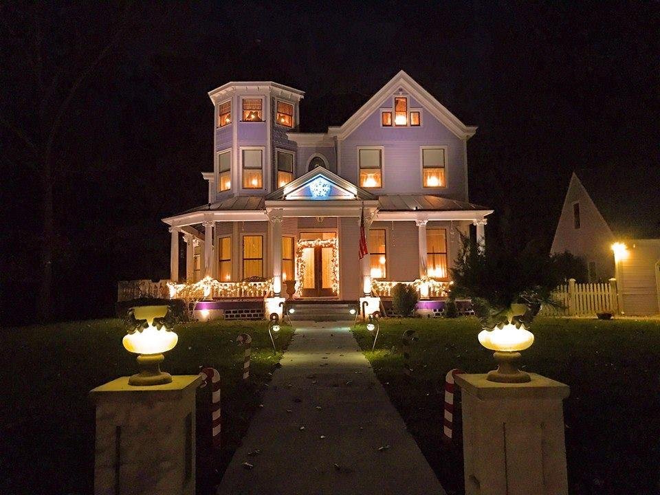 Paul took this picture of our house tonight. I still haven't put up the trees with the colored lights out front, but I am further ahead than I usually am at this point. Still lots to do, though!!!
