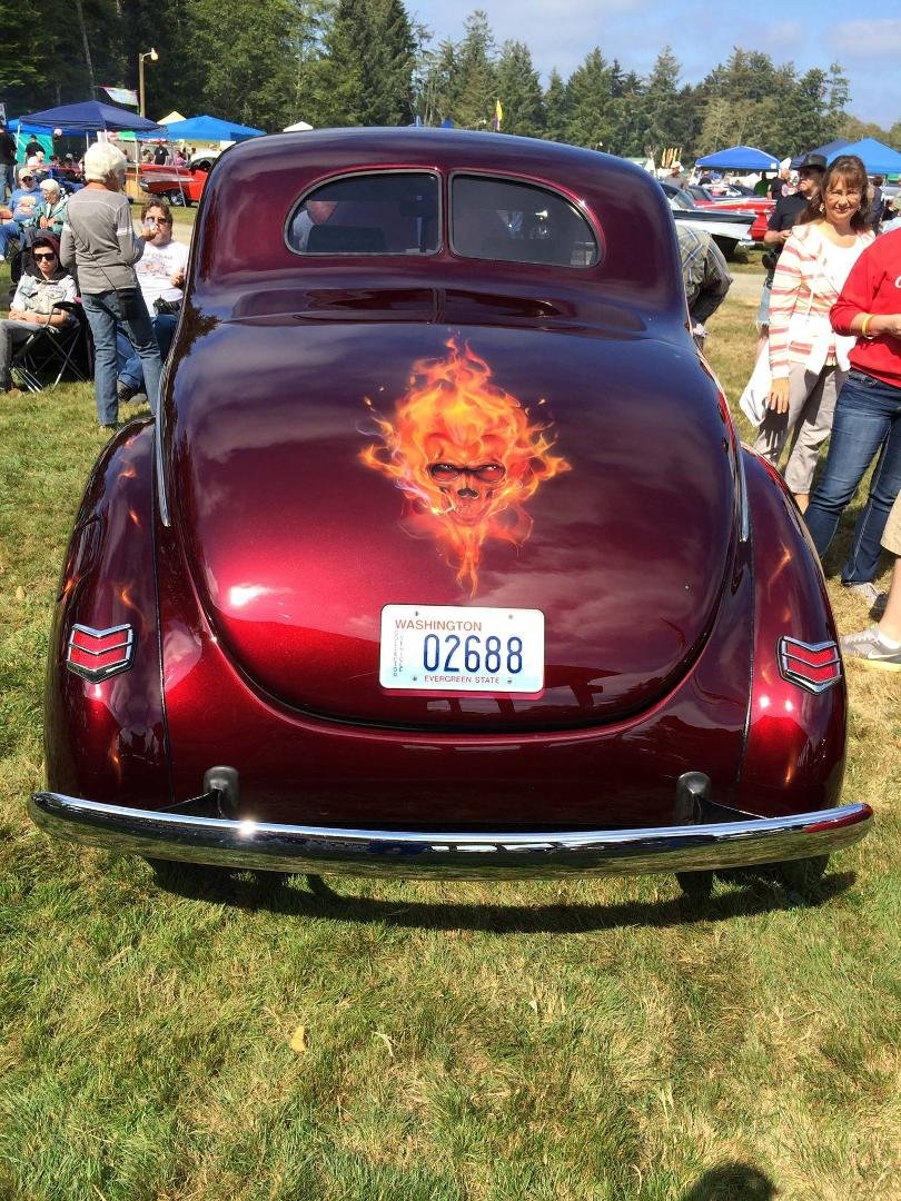At the Rod Run to the end of the world, Ocean Park, Wa. A very cool 40 Ford, the license plate is painted on the deck lid. Even up close it look real.