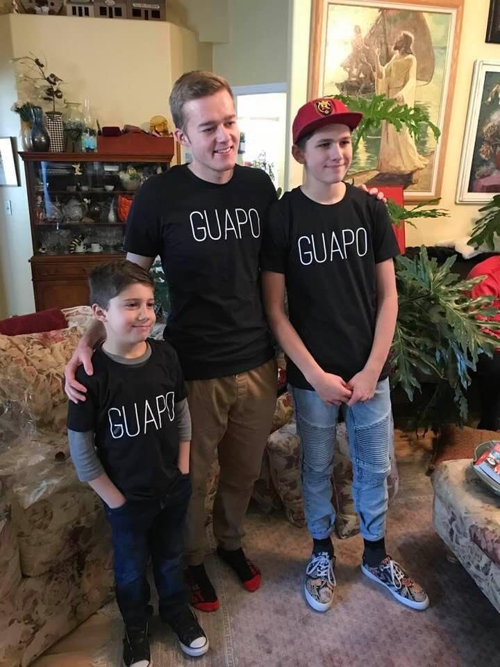 3 of 8 grandsons wearing shirts Ari made.