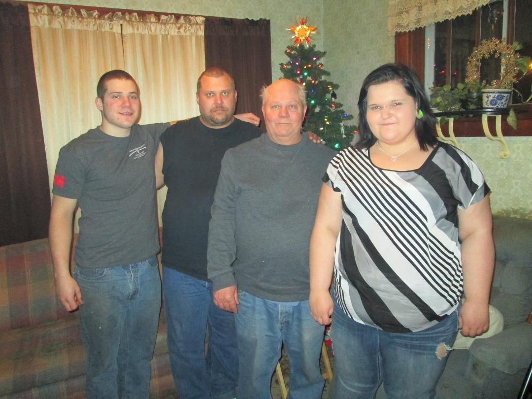 Stan with his son Dale and grankids Todd and Elizabeth.
