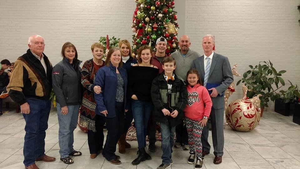 Ron, Stacey,Loretto, Michelle, Shelly, Catherine, Sam, Jonas Tony, Emily and Ron Schadegg at Mater Dei Catholic high school Christmas basketball tournament in Breese, Illinois.
