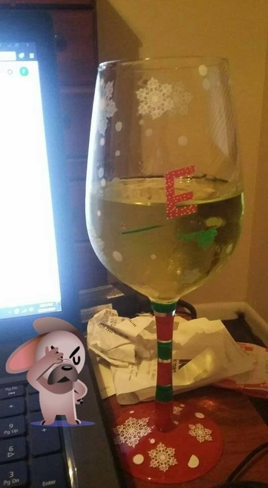 Down to the E from merry Christmas and that is a apple martini not wine...finish that off already