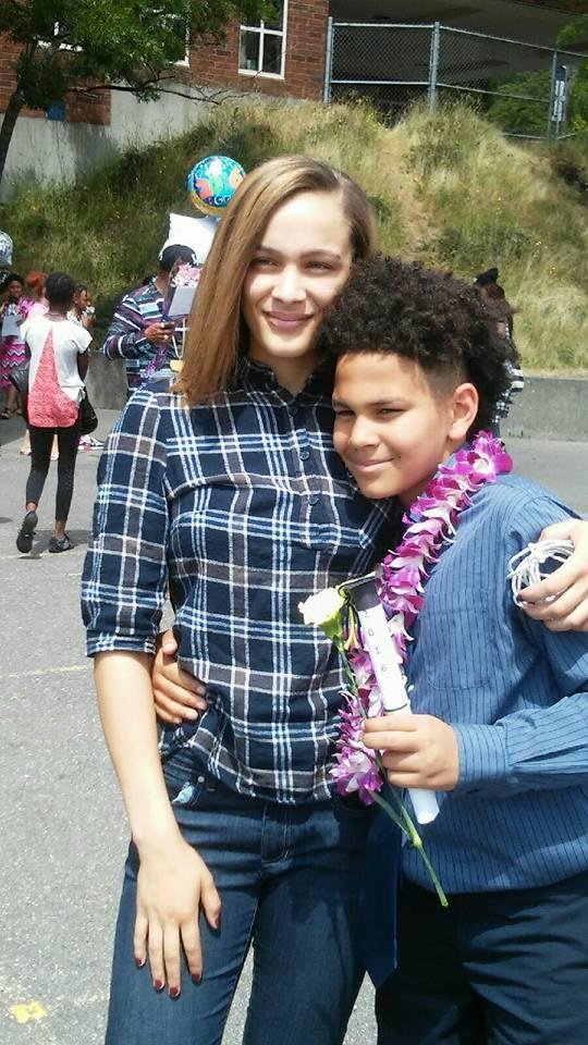 My grandson Harrisen Hightower as he graduates from 5th grade, sharing the moment with his sister Myla Hightower.