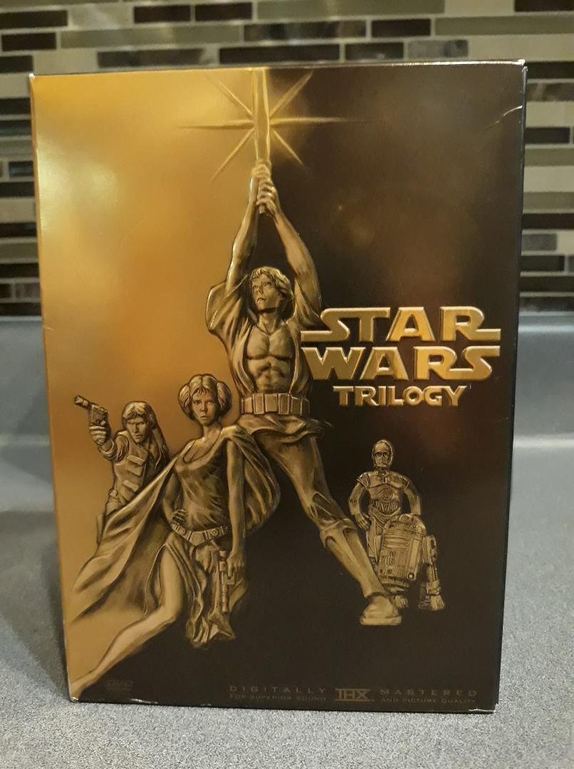 A pretty nice find at the Goodwill today. The first 3 Star Wars movie's. Which are now 4, 5 and 6.
I paid $3.00 for it! Brand new unopened it would be worth around $70. Used is about $35