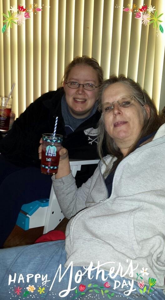 Wife and daughter watching the derby.