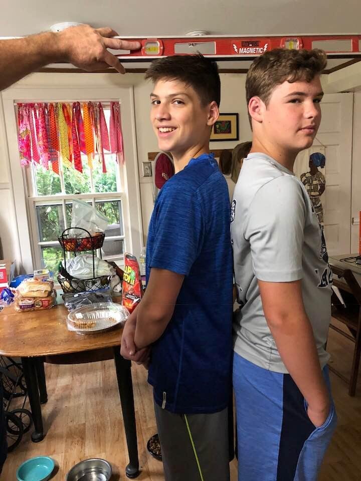 Two older grandsons —neck and neck!