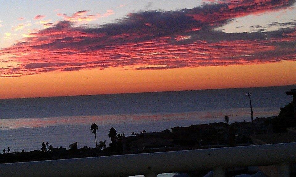 Sunset from our backyard a few minutes ago.