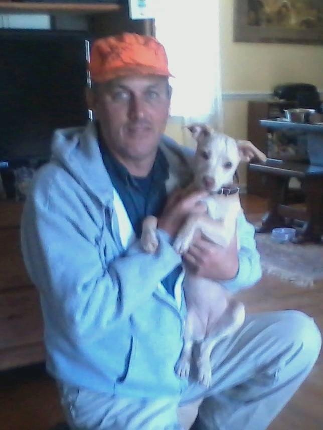 Stepson, "Michael McLawhorn came to hunt squirrels with his Dad yesterday and before he left to go home, he tried to find a way to take "the puppy" ( Belle) with him! Belle is 16 wks old and was bred by Maurice Pugh @ Sout