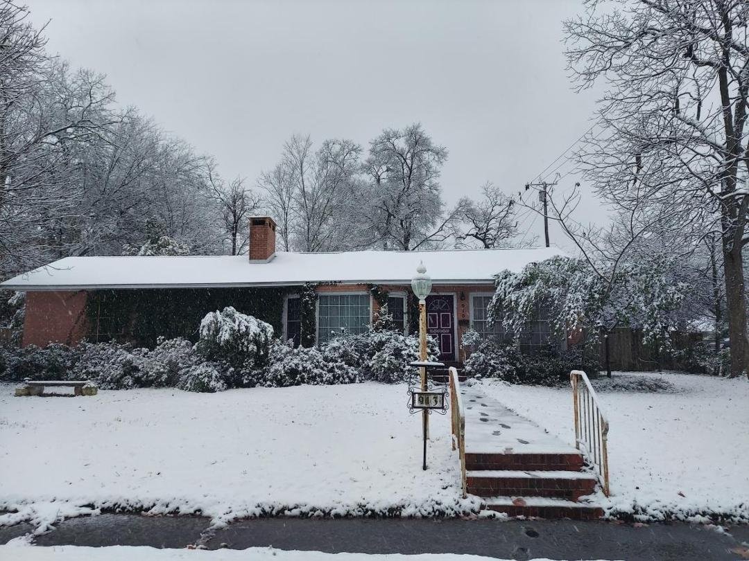 At home in East Texas today. It is still falling. No school tomorrow!