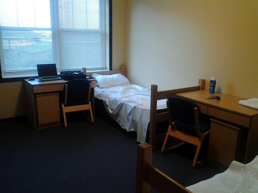 My luxurious dorm room at Hiram College. I'm wider than the bunk.