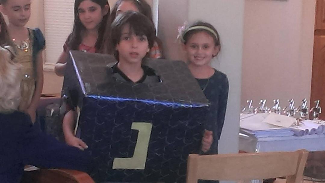 I guess it happens around this time of the year. Zachary turns into a dreidel.