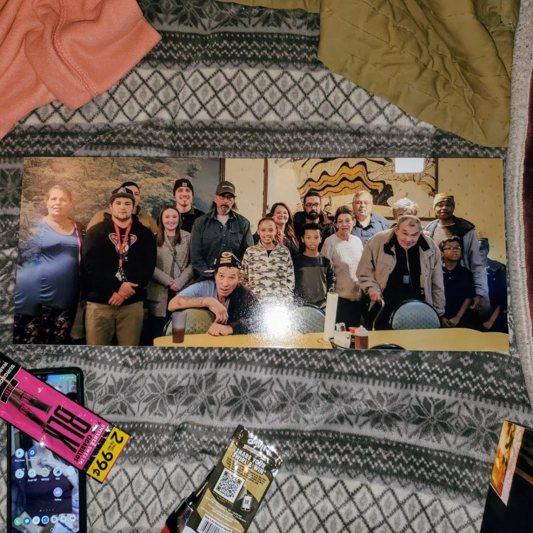 This was taken a year ina half ago with Rob"s whole family except for his cousin Jessica Castro but she took the picture. I had this picture put on wood from Walmart and I think it turned out so good. 

Also In the picture 