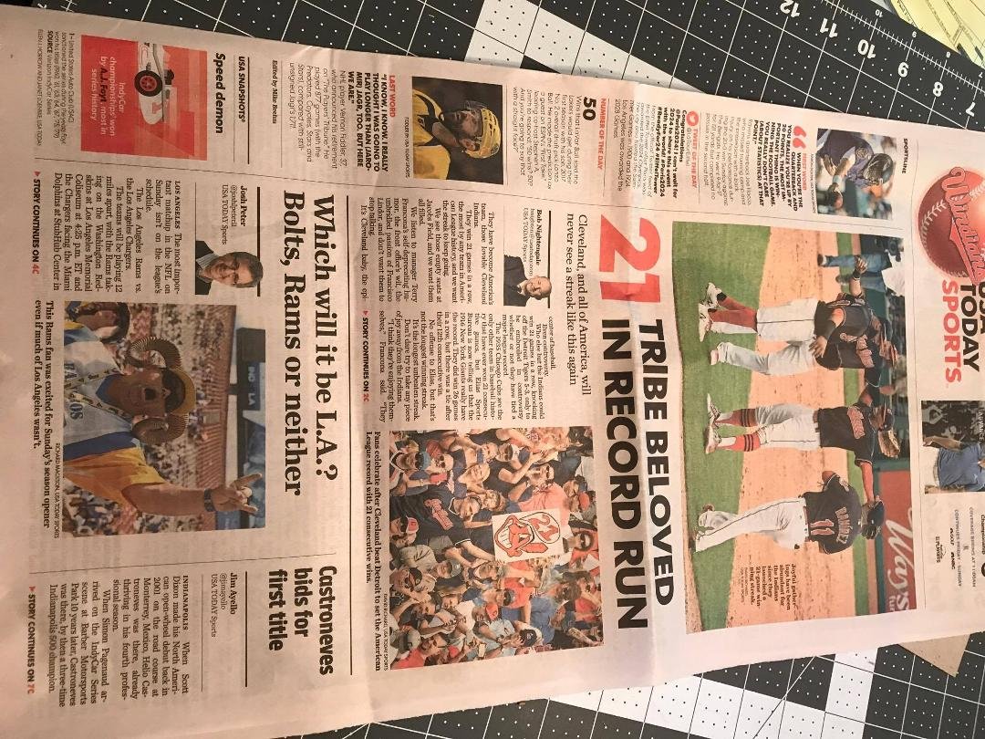 Yesterday's USA Today,,, Michelle and John to the right of Chief Wahoo.