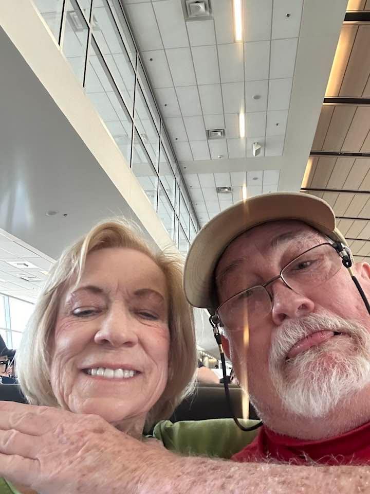 Waiting for our flight to Rome to start a Mediterranean cruise