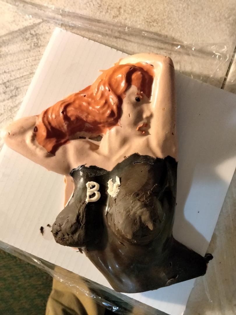 Here is a picture of a chocolate mold I made for this amazing lady I met yesterday I was working on the back of the racetrack on speedway boulevard directing people where to park and drive and I met this amazing lady from B