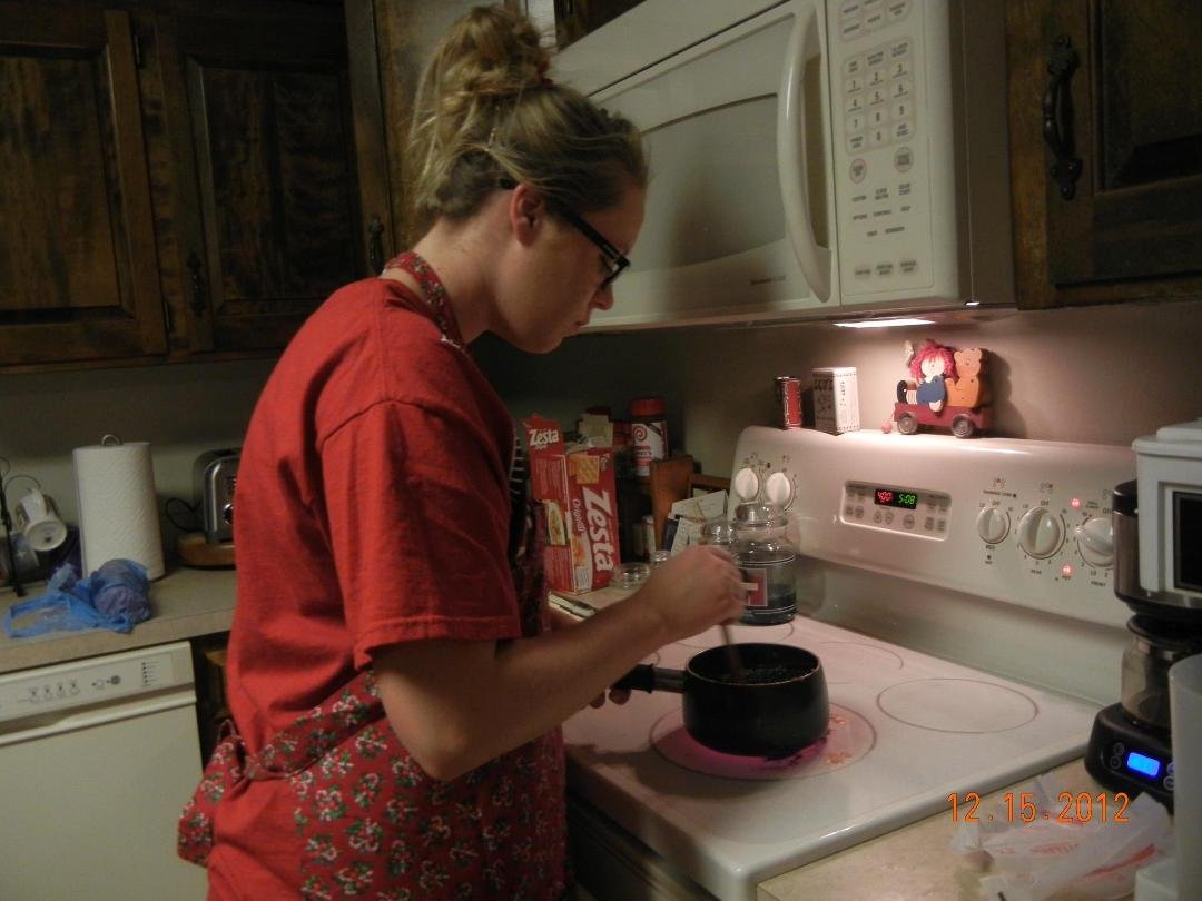 Lisa making goodies with Grandma.