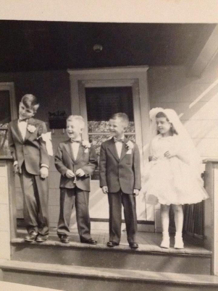 Post- First Holy Communion with me, cousins Daniel Ohar and Michael Ohar,and my sister Iris at our house on Esser Avenue in the Riverside neighborhood of Buffalo, New York. 1956?