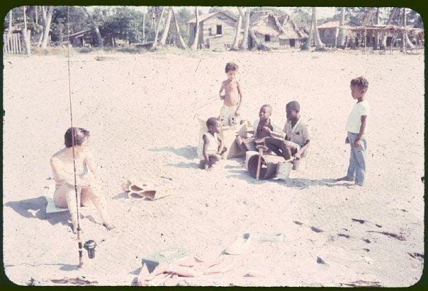 Carmen and I with some local blacks on the coast in the black village of La Travisia, Honduras.
Notice the musical instruments of the kids