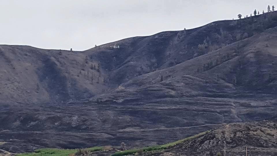 Lake Chelan, Wa. The hills black from the fires