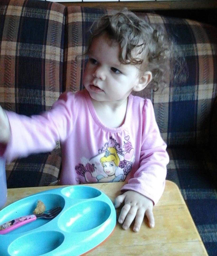 My adorable granddaughter Olivia, eating breakfast at Grandma's!
