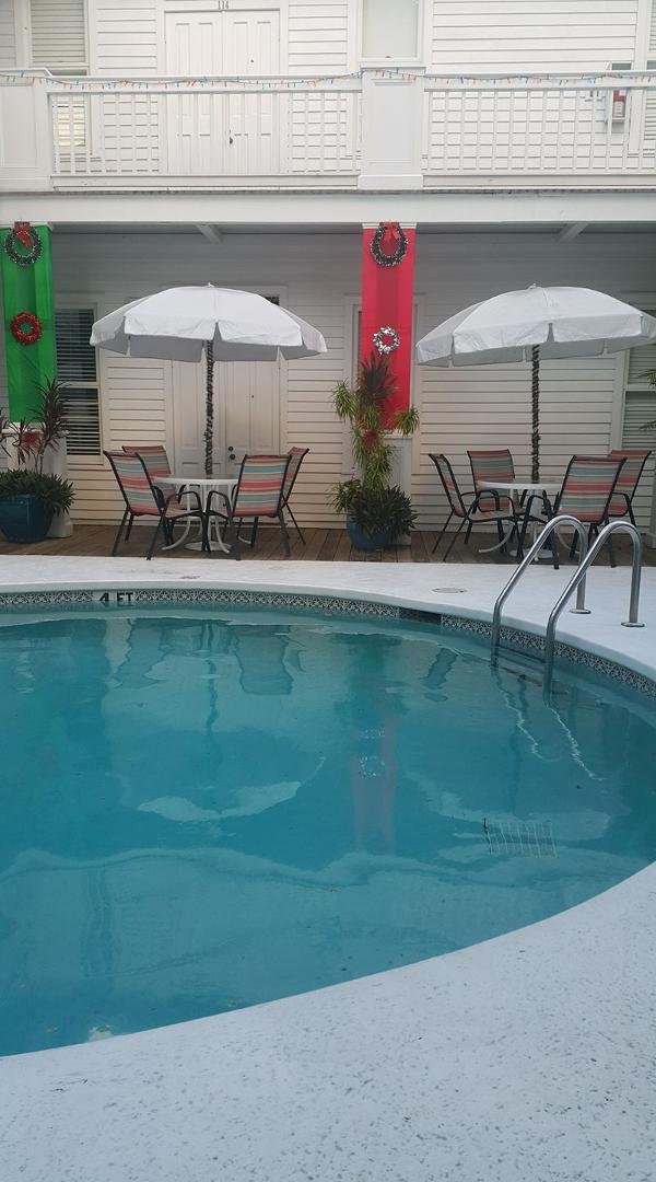 Poolside at Amsterdam Curry Mansion. Our room is on far right. Great breakfast included with room.