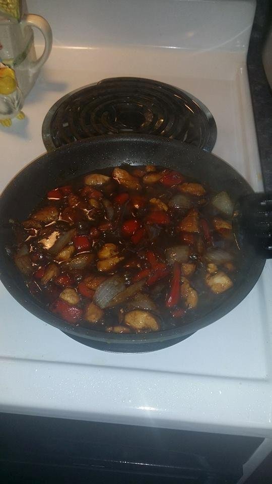 This is what my daddy Robin Woolum is fixing for supper. It was called Fajitas. I do not like it.