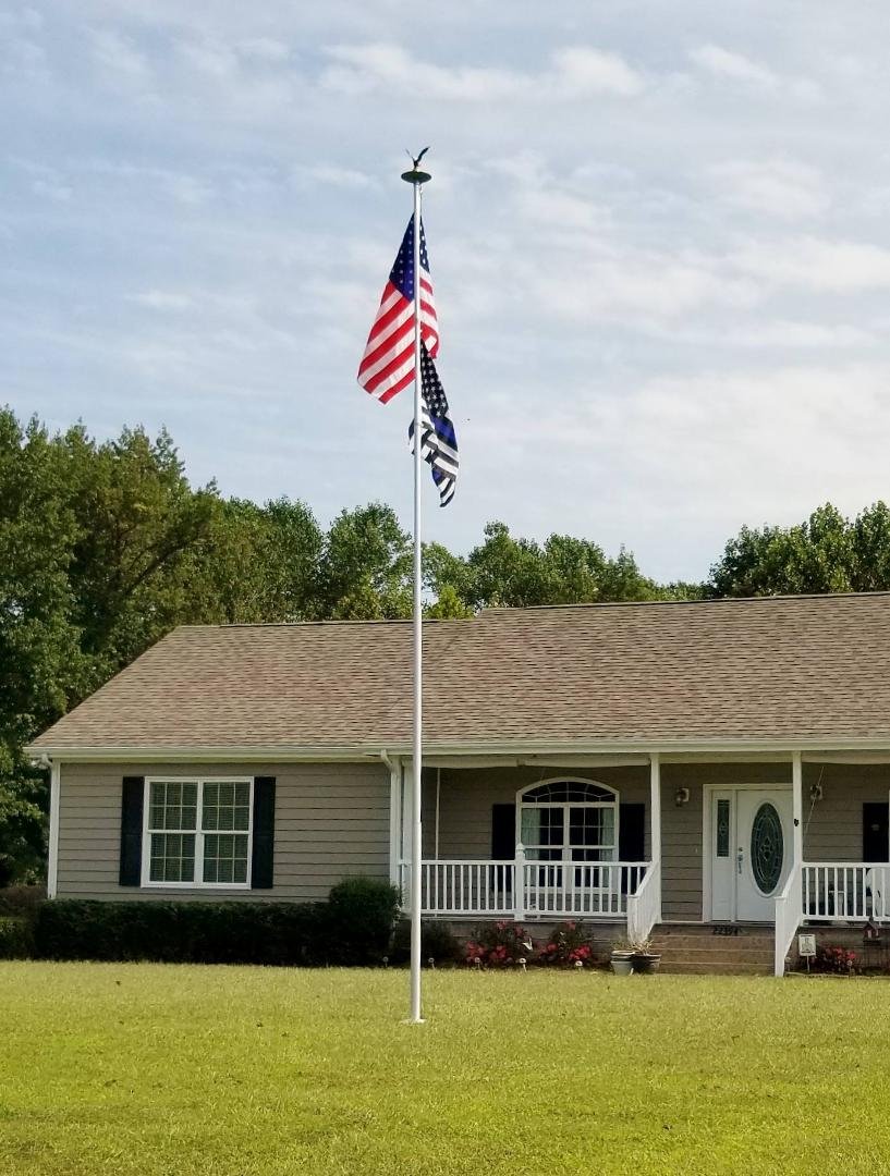 My 25' Titan Flagpole with optional Eagle, solar light and flash collar. I have watched it take 70 mph winds without damage and is rated at 95mph...Love it! 😍