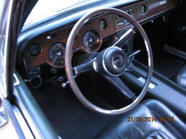 The much touted 67 steering wheel ON my 68 Cougar. Even the owner of West Coast Classic Cougars wanted to see pics of how it turned out. Realize non lovers of old cars could not care less..
