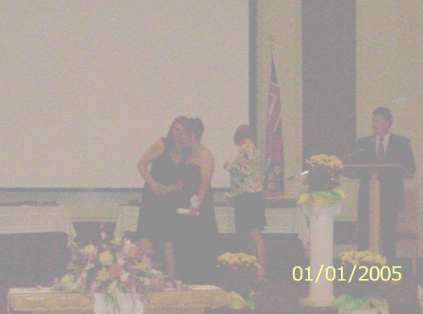 Recieving her diploma.
