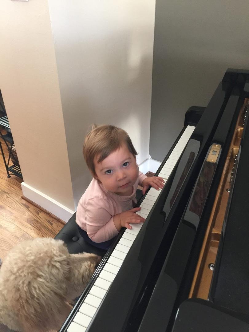 Elisa, learning to play piano from one of best, Bella!!