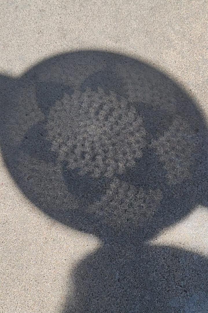 Viewing the partial eclipse at max, lousy, kitchen colander