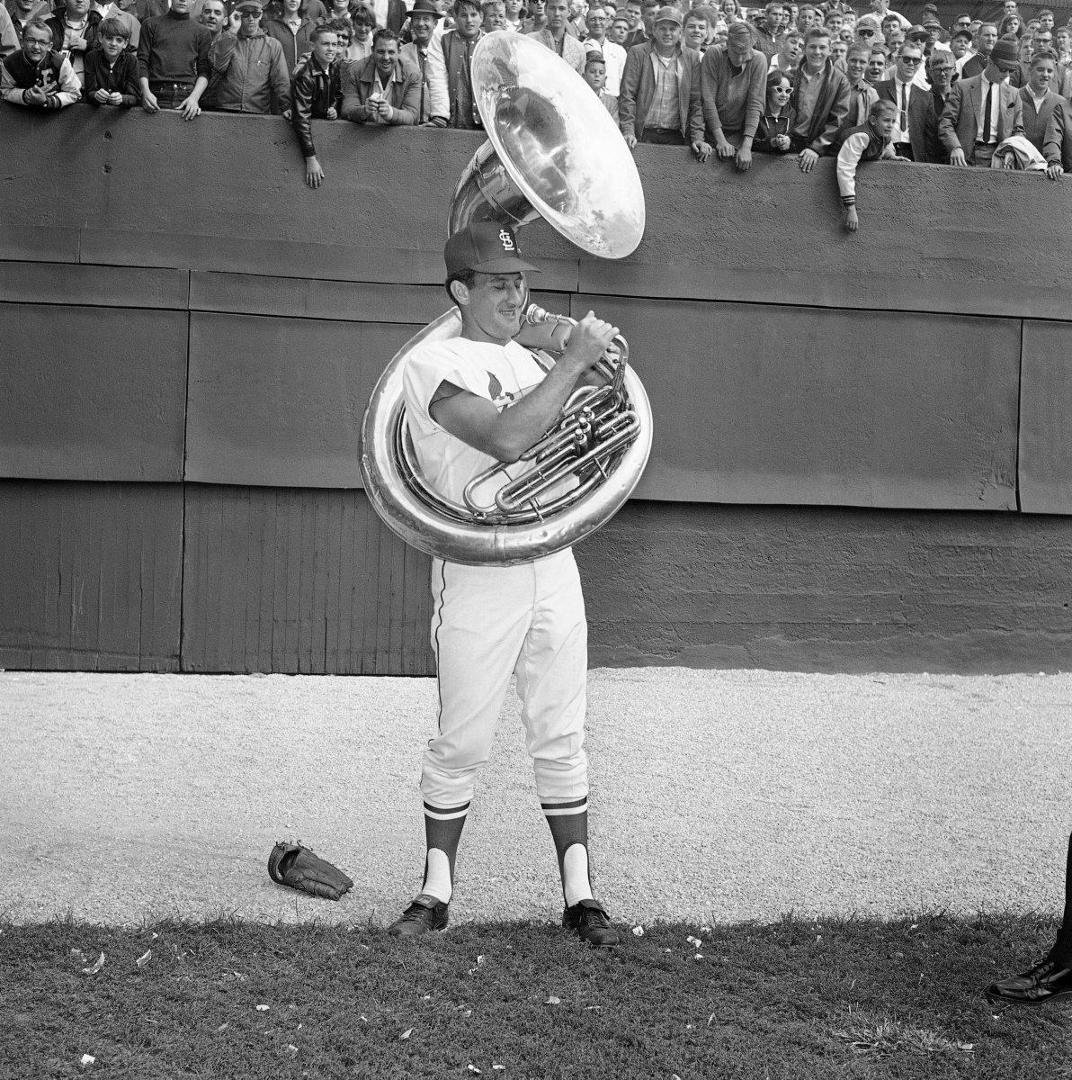 If life is getting too rough for you (for whatever reason), there's nothing like a photo of Bob "Mr. Baseball" Uecker shagging flies with a Sousaphone to bring a smile to your face. Enjoy.