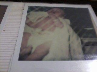 Baby Keeling's First Pose in Hospital though the nursery glass!