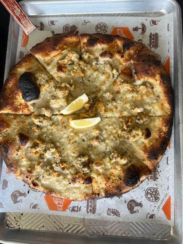Yum- New Haven style clam pizza! Fresh shucked, coal fired oven. Ah Beetz, Del Ray FL
