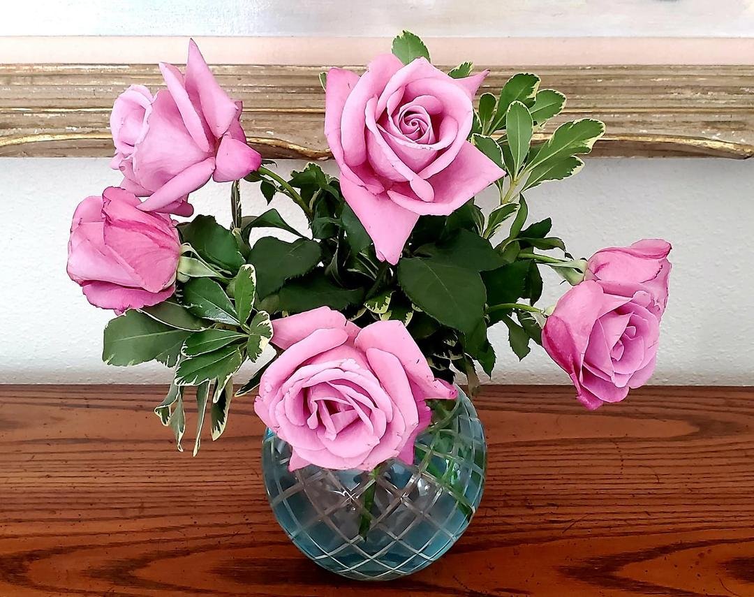 My roses are pink and my vase is blue...