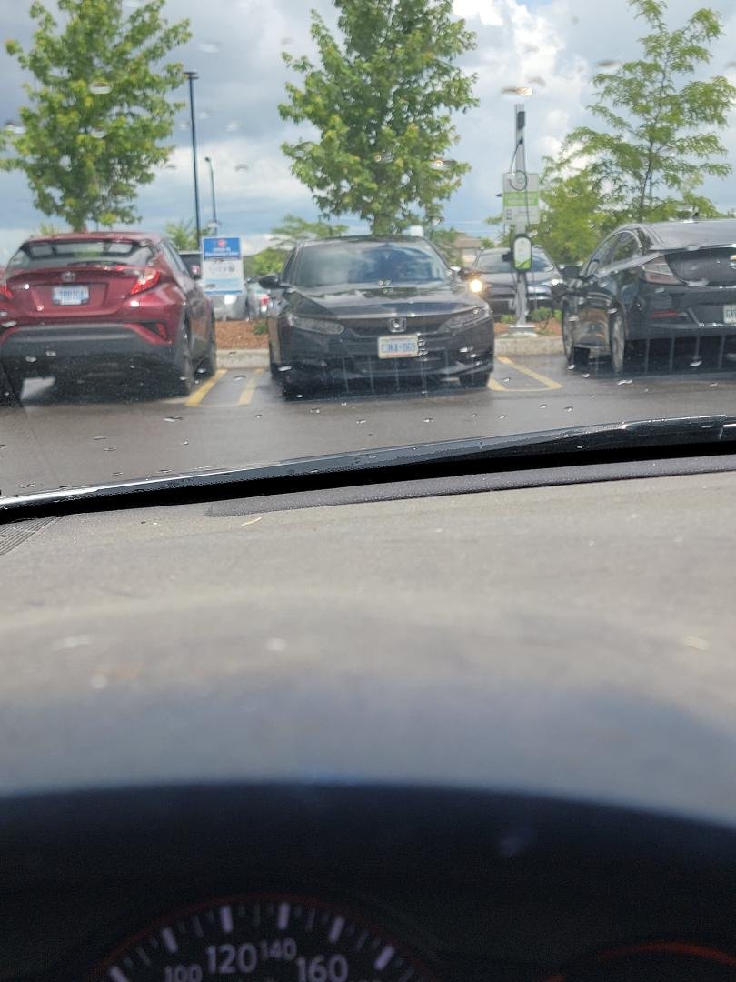 Somebody can't read, those 2 spots are for electric vehicles only.