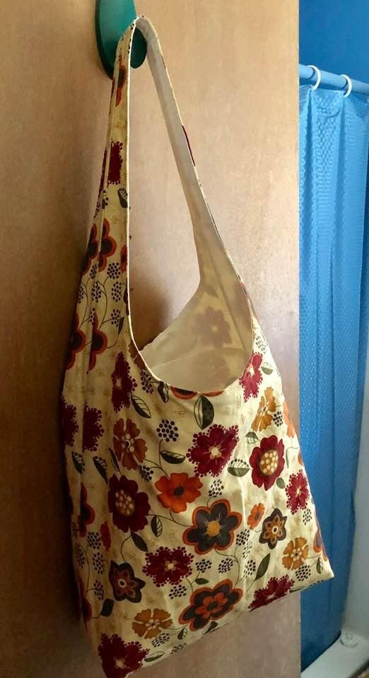 This is the second very cool bag. It’s bigger and the reason I like it is because it is a shoulder bag with just ONE strap. No having to fiddle around with a strap on each side. You just put it over your shoulder and walk a