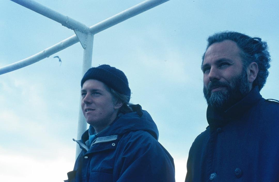 On the Aegean Sea, en route to Santorini, March 4, 1972. My travel companions, Tracy Roberts and Marc Norelli. Photo by Mark W Geiger, 1972.
The blue tint comes from the aging of Agfachrome color film. Kodak and Fuji hold
