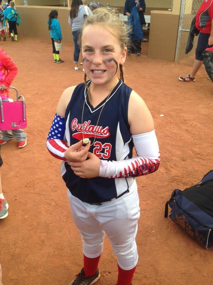 My oldest granddaughter and their first place softball tournament ring.
Congratulations Kynsie
