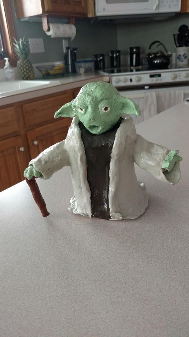 Hey look! Uncle Daniel H Harig... Emily Mokma made this in art class!