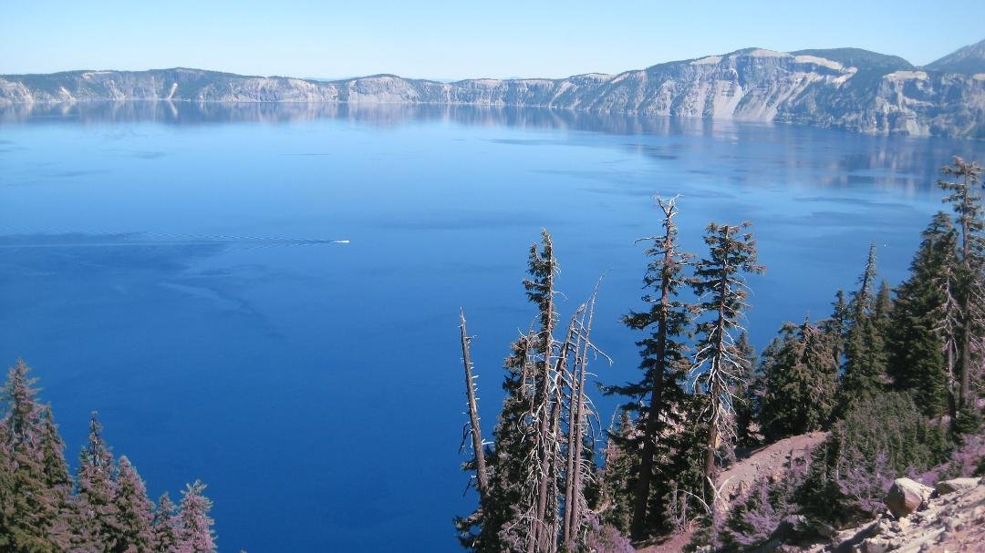 Crater Lake, as it is now called, was created 7500 years ago when A 14,000 foot volcano erupted and the mountain collapsed within itself. After 1000 years rain and snow filled the crater to create the lake. There are no spr