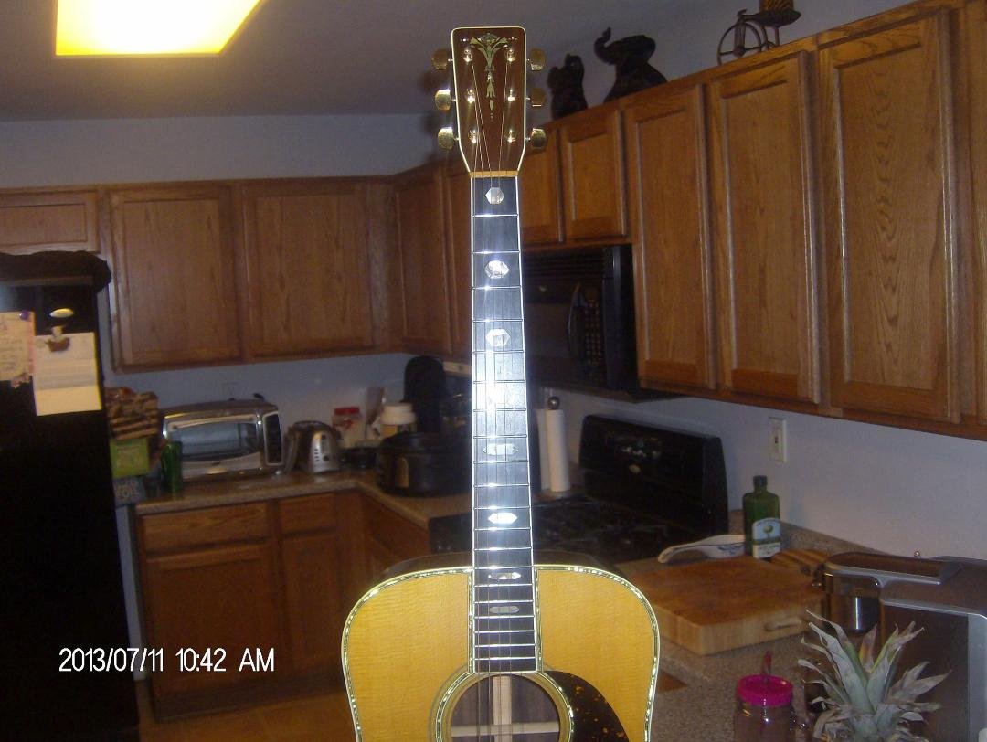 I think that the custom torch stock on the head stock really sets the guitar apart! Also I really worked hard on the finger board inlays!
My goal was to take my all time favorite acoustic guitar and duplicate it just as clo