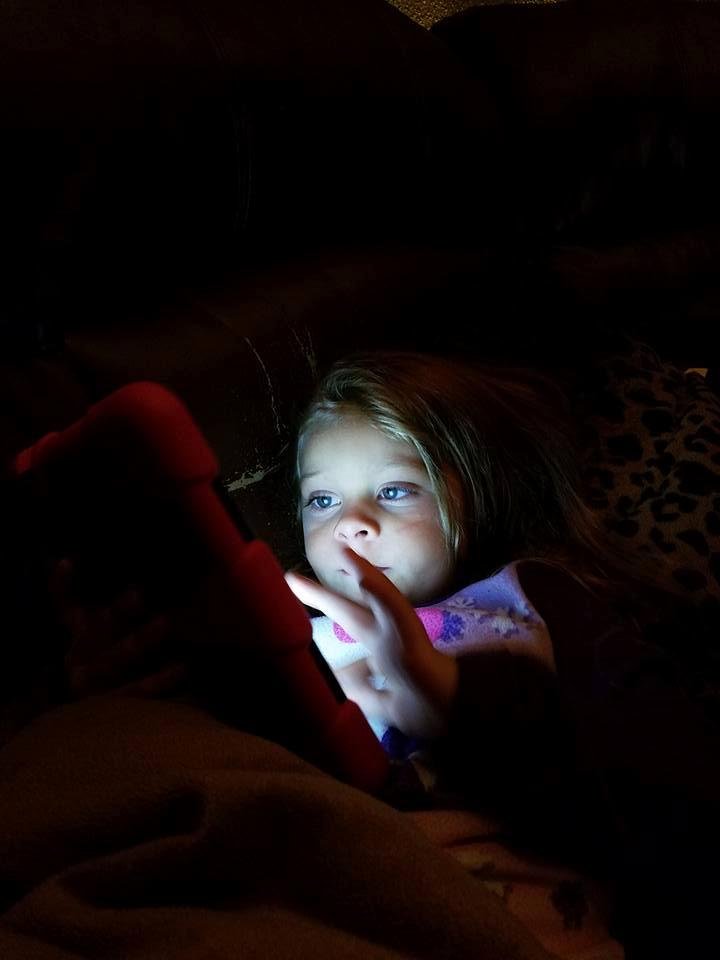 KK playing with her computer