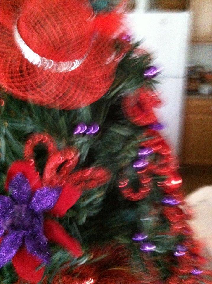 Four of the eight hats on my tree.